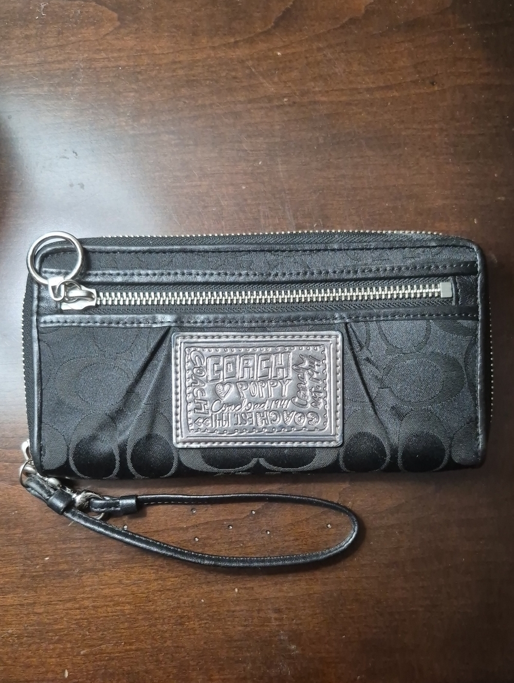 Coach Poppy Wallet Black Signature Silver Patch Wristlet